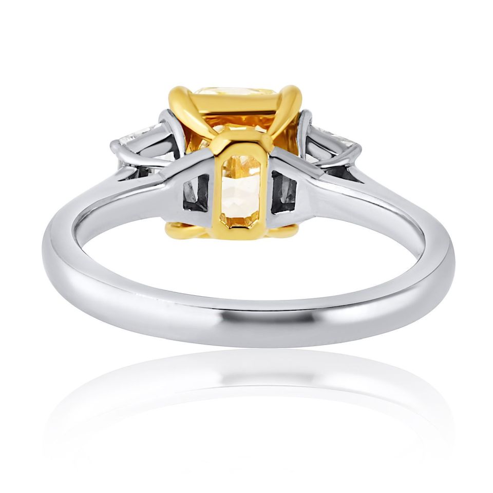 1.06 carat Round Diamond L 2 Side Traps approx. .40 cts Ring